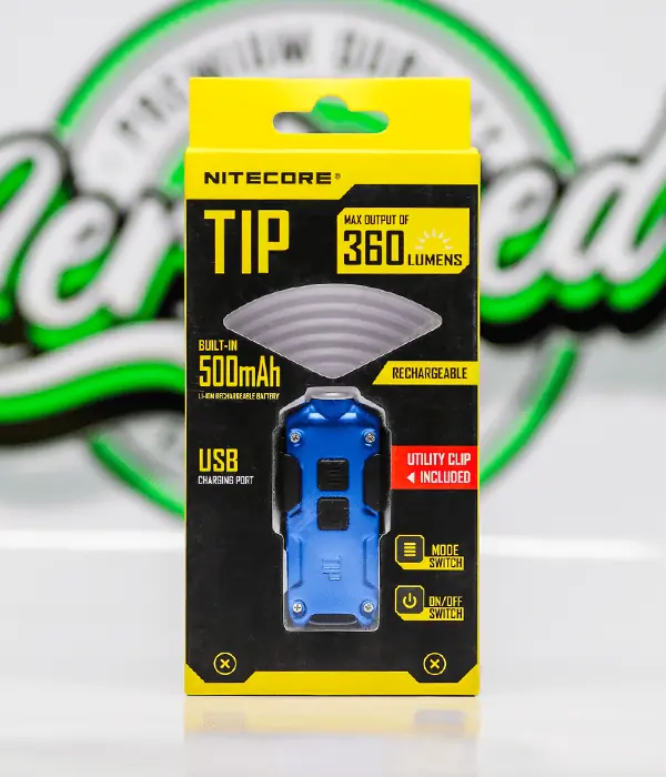 Blue Nitecore TIP LED keyring torch sealed on its yellow retail card showing 360 lumens and a 500mAh battery