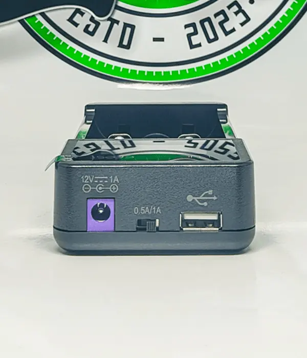 Top panel of Efest LUC V2 with 12V DC input, 0.5A 1A switch and USB-A output