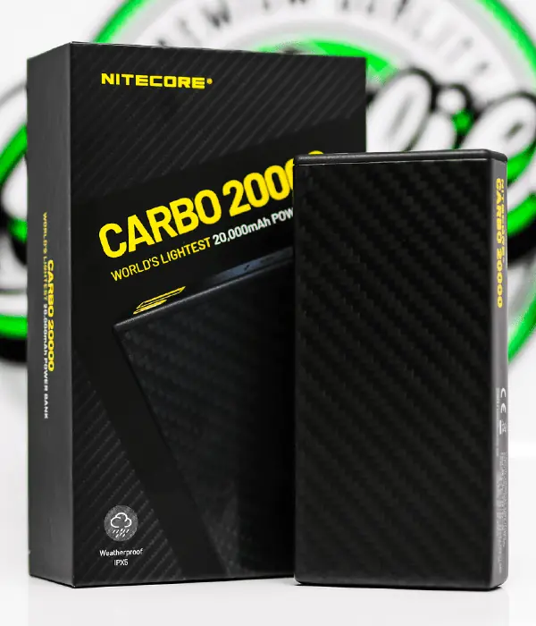 Nitecore CARBO 20000 carbon fibre power bank standing beside its retail box