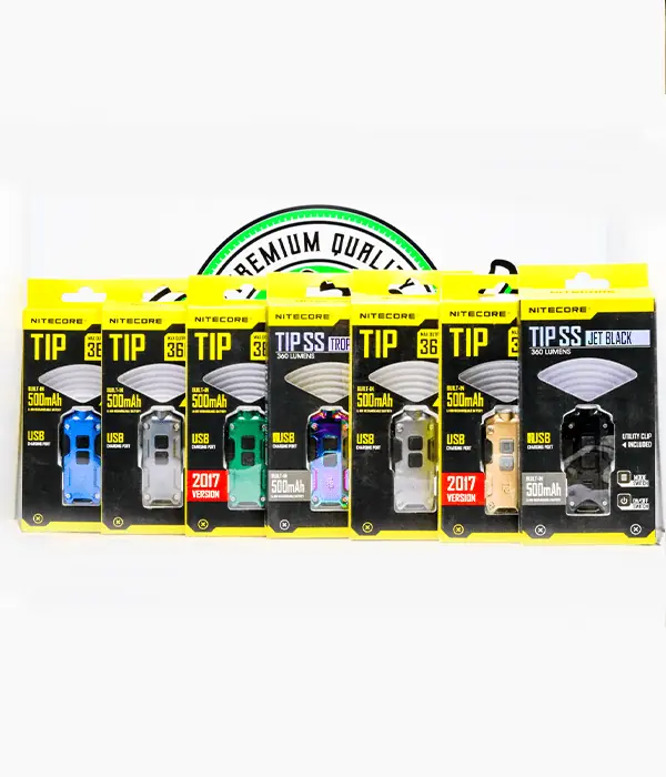 Lineup of Nitecore TIP and TIP SS retail boxes showing multiple colour options including blue silver green tropical gold and black
