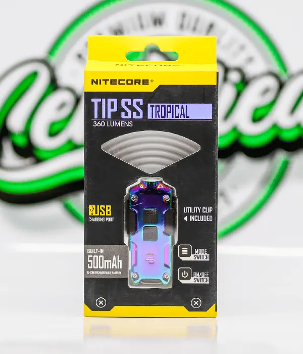Nitecore TIP SS Tropical keyring torch with an iridescent rainbow stainless steel body in its retail blister pack