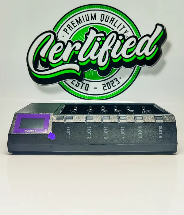 Angled view of the grey Efest LUC Blu6 charger with its purple display, round purple button and six numbered slots