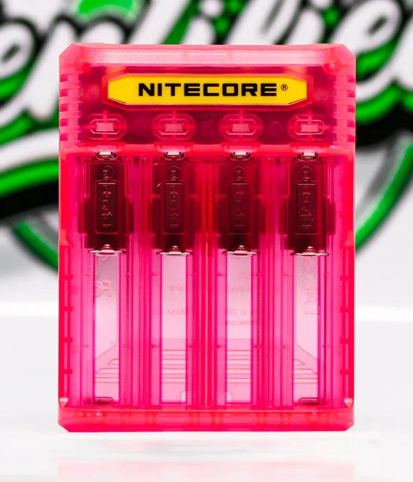 Top view of the hot pink Nitecore Q4 charger showing four empty battery bays and the NITECORE logo