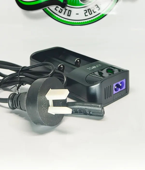 Efest LUSH Q2 charger angled to show its purple figure-8 power inlet beside a coiled Australian mains lead
