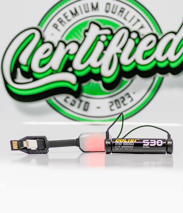 Nitecore LC10 clamped to both ends of a Golisi S30 18650 cell with its translucent module glowing red while charging