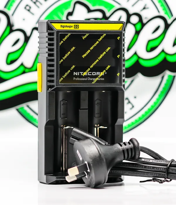 Nitecore D2 charger pictured with a coiled black mains lead and its angled Australian three-pin plug resting in front