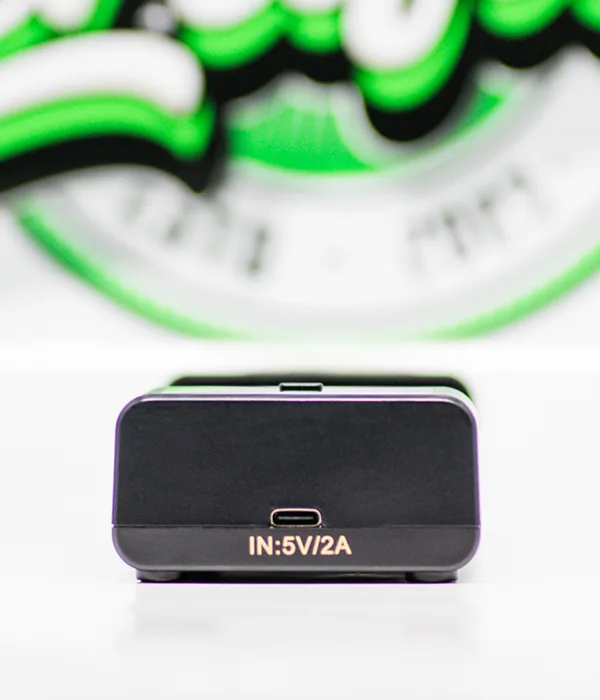 Rear edge of the Golisi i2 charger with its USB input port labelled IN:5V/2A on the matte black housing