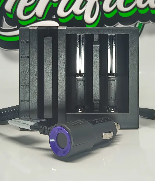 Efest LUC S2 two-bay charger with a black 12V car adapter and coiled lead resting in front of its open bays
